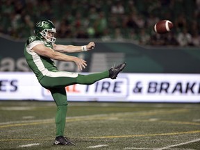 Punter Jon Ryan, shown here punting for his hometown Saskatchewan Roughriders in 2021, has retired from football as a player.