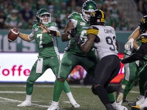 The Saskatchewan Roughriders' offensive line has reliably protected quarterback Cody Fajardo, 7, over the team's first two games in 2021. Right tackle Cameron Jefferson is shown blocking for Fajardo during Saturday's 30-8 victory over the visiting Hamilton Tiger-Cats.