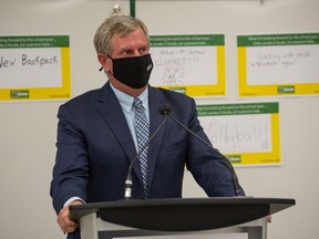 Shawn Davidson, president of the Saskatchewan School Boards Association, speaks to media regarding the upcoming school year at a news conference held at St. Jerome School in Regina, Saskatchewan on August 31, 2021.