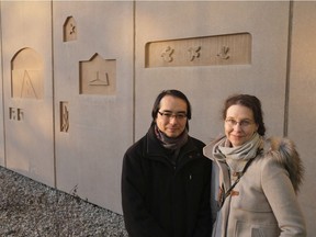 Dr. Tzu-Chiao Chao and Dr. Nicole Hansmeier outside the Riddell Centre at the University of Regina on Dec. 4, 2020.