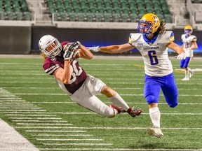 Rylan Sokul of the Regina Thunder makes a spectacular, 42-yard catch despite tight coverage from Jared Giddings of the Saskatoon Hilltops in Prairie Football Conference action Saturday at Mosaic Stadium. Sokul's big play set up the game-winning touchdown. Wanda Harron Photography.