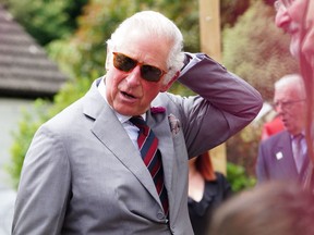 Prince Charles meets local residents on July 9, in Ponthir, near Newport, Wales.