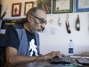 Solomon Ratt, associate professor of Indigenous languages at FNUniv, looks on his computer screen on Thursday, September 16, 2021 in Regina.