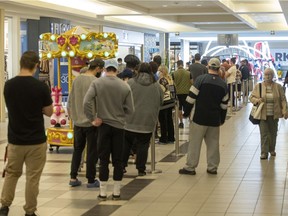 There was a fairly long line of people waiting at the walk-in COVID-19 vaccine clinic at the Southland Mall on Friday, September 17, 2021 in Regina, a day after the province announced new COVID-19 measures, including proof of vaccination passports.