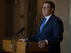 Saskatchewan Premier Scott Moe addressees the media regarding the results of the previous day's federal election during a news conference held in the rotunda at the Saskatchewan Legislative Building in Regina, Saskatchewan on Sept. 21, 2021.