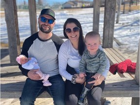 Jesse Andrews, centre, is frustrated that surgery for her eldest son Jackson, right, has been postponed because of a surge of unvaccinated people with COVID-19 in hospital.