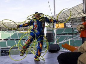 Terrance Littletent and his brother Jayson perform at Mosaic Stadium during an event to announce Miyo-wîcîwitowin, a national Truth and Reconciliation event taking place next year.