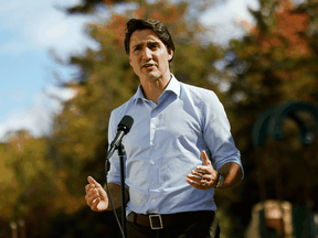 Prime Minister Justin Trudeau speaks to media after visiting a vaccination clinic in Ottawa, September 28, 2021.