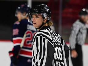 Alex Clarke — the first female official in WHL history — is shown while working the lines Friday at Mosaic Place during a pre-season game between the Moose Jaw Warriors and Regina Pats.