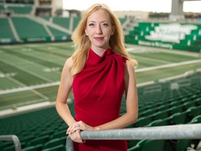 Regina's Lindsay Dunn, who is a sports and music reporter for City News in Toronto, stands inside Mosaic Stadium in Regina.