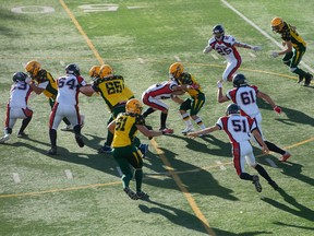 Miller Marauders linebacker Harley Tolver-Seitz attempts to tackle Campbell Tartans running back Jax Noble in Regina Intercollegiate Football League action Thursday at Leibel Field. Noble rushed for 225 yards and scored all four Campbell touchdowns in Miller's 50-28 victory.