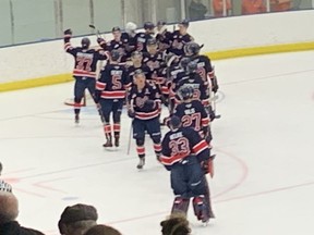 The Regina Pats celebrate a 5-4 pre-season victory over the Winnipeg Ice on Friday at the Co-operators Arena.