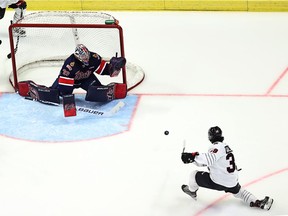 The Moose Jaw Warriors' Matthew Gallant, right, scored twice against Regina Pats goaltender Spencer Welke on Saturday at the Brandt Centre.