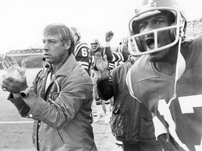 Ron Lancaster, left, and Joey Walters celebrate on Oct. 14, 1979, when the Saskatchewan Roughriders recorded their first victory of a generally dismal season.