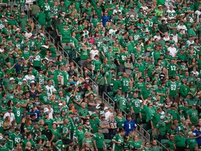 Fans are seen in the stands during a CFL football game between the Saskatchewan Roughriders and the Winnipeg Blue Bombers at Mosaic Stadium in Regina, Saskatchewan on Sept. 5, 2021.