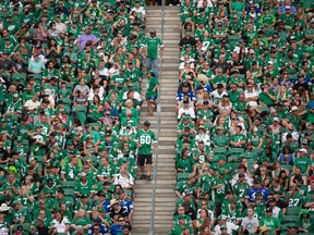 Fans are seen in the stands during a CFL football game between the Saskatchewan Roughriders and the Winnipeg Blue Bombers at Mosaic Stadium in Regina, Saskatchewan on Sept. 5, 2021.
