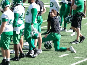 Saskatchewan Roughriders quarterback Cody Fajardo (7) takes a knee during Tuesday's practice at Mosaic Stadium. Fajardo was limited during practice he's still in concussion protocol.

BRANDON HARDER/ Regina Leader-Post