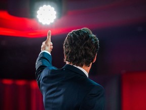 Canadian Prime Minister Justin Trudeau gives a thumbs up as he arrives to deliver his victory speech after snap parliamentary elections at the Fairmount Queen Elizabeth Hotel in Montreal, Quebec, early on September 21, 2021.