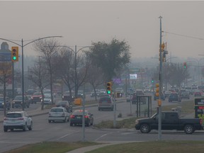 Smoke sits over 8th Street in Saskatoon, Sask. on Monday, Oct. 4, 2021.