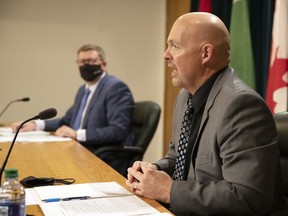 Saskatchewan Public Safety Agency head Marlo Pritchard, pictured at right, said Wednesday that he was unaware of how the number 12 began showing up in reports of planned patient transfers.