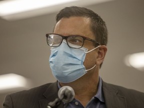 Health Minister Paul Merriman speaks with reporters after receiving his seasonal flu shot as part of this year's influenza immunization campaign on Thursday, October 14, 2021 in Regina. TROY FLEECE / Regina Leader-Post