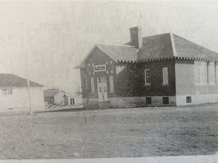  The historic Little Brick Schoolhouse in Val Marie, Saskatchewan in 1945. When the Schoolhouse first opened in 1927, there were 51 students enrolled. There were two classrooms on the main floor, but by 1939, overcrowding caused some classes to be moved to the nearby Catholic Convent where school was taught by the nuns until 1948. Photo courtesy of Prairie Wind and Silver Sage Friends of Grasslands.