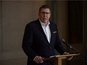 Saskatchewan Premier Scott Moe speaks to media, regarding the COVID-19 pandemic, in the rotunda in the Saskatchewan Legislative Building in Regina, Saskatchewan on Oct. 18, 2021. Moe addressed the media following a decision to send six patients, critically ill with COVID-19, to Ontario for care.