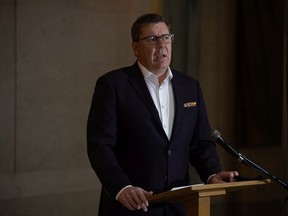 Saskatchewan Premier Scott Moe speaks to media regarding the COVID-19 pandemic in the rotunda in the Saskatchewan Legislative Building in Regina in October 2021.