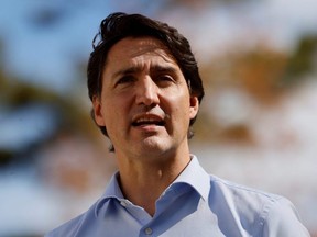 Prime Minister Justin Trudeau speaks to media after visiting a vaccination clinic in Ottawa, Sept. 28, 2021.