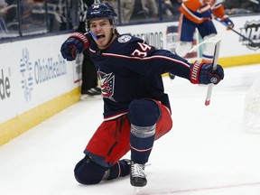 Columbus Blue Jackets rookie Cole Sillinger celebrates his first NHL goal, scored against the New York Islanders on Oct. 21.