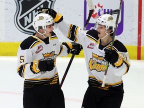 After scoring his first WHL goal, the Brandon Wheat Kings' Logen Hammett, left, is congratulated by teammate Rylen Roersma at the Brandt Centre during a March 24 game against the Moose Jaw Warriors. Keith Hershmiller Photography.