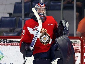 Regina Pats goaltender Matthew Kieper celebrates Saturday's 5-2 victory over the Prince Albert Raiders at the Brandt Centre.