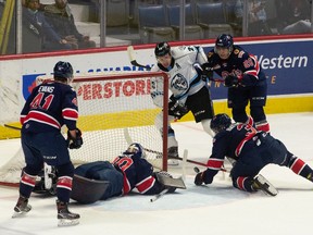 Regina Pats goaltender Matthew Kieper makes a sliding save against the Winnipeg Ice on Friday at the Brandt Centre.