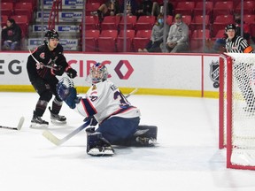 The Moose Jaw Warriors' Matthew Gallant scores his first WHL goal, beating Regina Pats netminder Matthew Kieper on Oct. 8 at Mosaic Place.