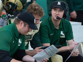 The University of Regina Rams' Mark McConkey, right, celebrated his first Canada West head-coaching victory Saturday.