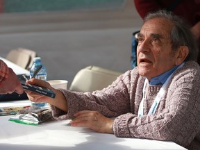 Henry Woolf signs autographs at the Word on the Street book and magazine festival on Broadway Avenue in Saskatoon on September 21, 2017.