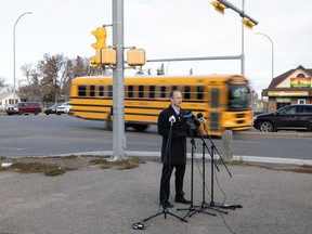 Tyler McMurchy, a spokesperson for SGI, speaks to members of the media regarding safe winter driving during a news conference held at the intersection of Dewdney Avenue and Lewvan Drive in Regina, Saskatchewan on Nov. 1, 2021. According to SGI, that intersection sees the most collisions in Regina.