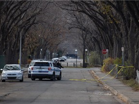 Regina Police Service officers on scene in the 1200 block of Rae Street in Regina, Saskatchewan on Monday, Nov. 1, 2021 investigate the killing of a 16-year-old girl.