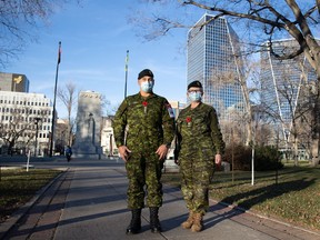 Capt. Doug Murphy, left, and Maj. Linda Jackson of the Canadian Armed Forces in Victoria Park in Regina on Nov. 4, 2021. The soldiers are part of the Canadian military's medical support team helping Saskatchewan in its fight against COVID-19.