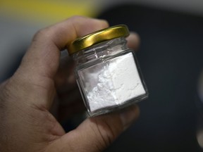 A jar of Prairie Lithium's lithium chloride, the final product of the lithium extraction process.