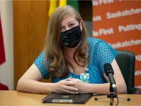 Kirsten Finn at the Saskatchewan legislature where the NDP raised the costs of her son Conner's surgery in the U.S.