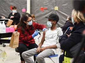 REGINA, SASK : November 24, 2021 -- In photos provided by the Saskatchewan Health Authority, children 5-11 years old getting the COVID-19 vaccine at the Regina clinic. The SHA did not provide names for any of the people in the images. Saskatchewan Health Authority.