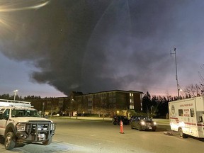 Abbotsford, B.C. police are urging residents to remain indoors and keep doors and windows closed due to the heavy smoke emanating from an RV sales centre fire.