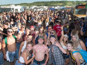Festival-goers enjoy the afternoon together in the camping area during the 2019 Country Thunder music festival.