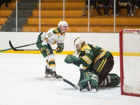 University of Regina Cougars goaltender Brandon Holtby makes one of the 50 saves he registered while shutting out the University of Alberta Golden Bears on Saturday in Edmonton.