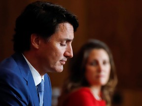 Deputy Prime Minister and Minister of Finance Chrystia Freeland, seen here with Prime Minister Justin Trudeau, is expected to give this fall the government's first major statement on taxes and spending since Trudeau's Liberal Party won re-election.