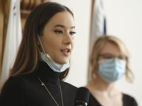 Ariana Donovan speaks about her work experiences as a model in the fashion industry during an NDP press conference at the Legislative Building in September.