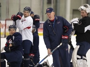 John Paddock, who has returned to the bench with the Regina Pats, guides the players through a practice session Thursday at the Co-operators Centre. Paddock, the Pats' general manager and vice-president of hockey operations, fired head coach Dave Struch earlier in the day.