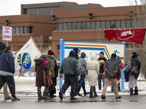 A small group  protested out front the RCMP headquarters in support of Wet'suwet'en First Nation  and protesters in B.C.