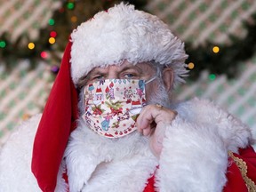 Santa Claus eyes columnist Rob Vanstone with rightful suspicion during the annual, exclusive holiday-season interview.
